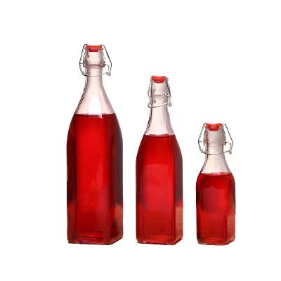 China Swing Top Square Flip Top Glass Bottle Swing Top Brew Bottle With Stopper for sale