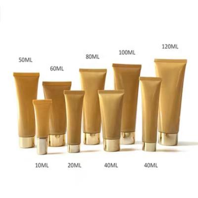 China 50g 100g Gold Squeeze Bottle Extrusion Lotion Tube Face Detergent Packaging Tubes Cosmetic Pearlescent Bright Tube for sale