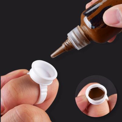 China Disposable Glue Dye Rings Makeup Glue Holder and Wick Ring Rings Plastic Rings for Eyelash Extension Nail Art Adhesive Glue Holders for sale