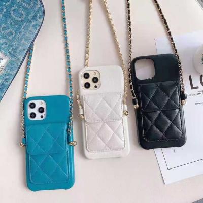 China Luxury Designer Shockproof DrangonS PU Leather Customize Logo Fancy Mobile Phone Case For 11 12 13 14 With Chain Strap for sale