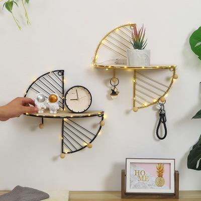 China Modern Viable Single Hook Helix Shaped Shelf Iron On Wall Universal Main Hook For Living Room Wall Decoration for sale