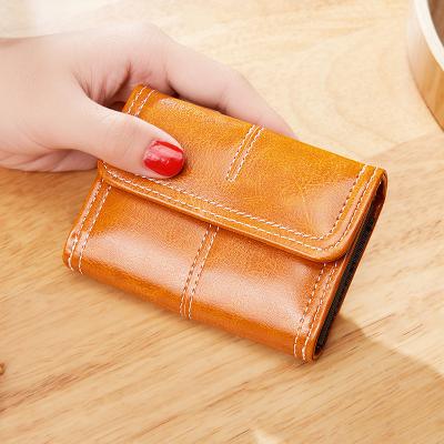 China 2022 New Style Wax Oil Coin Purse Ladies Retro Multi-Card Mini Organ Card Wallet Fashion Waterproof Short Simple Women for sale