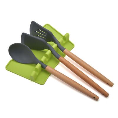 China Sustainable Kitchen Utensils Spatula Eggbea Silicone Spoon Holder Rest Pad for sale