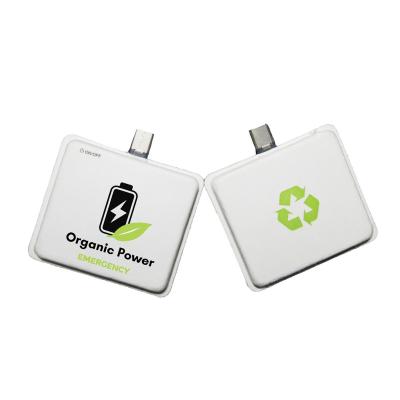 China OEM Logo Mini Paper Capsule Wireless Charging Disposable Power Bank With Short Cable Disposable Battery Charger for sale