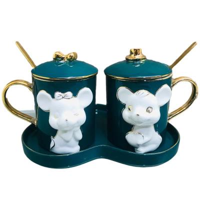 China Viable Green Color Glazed Gold Handle Embossed Mickey Mouse Coffee Mug With Heart Shaped Saucer for sale