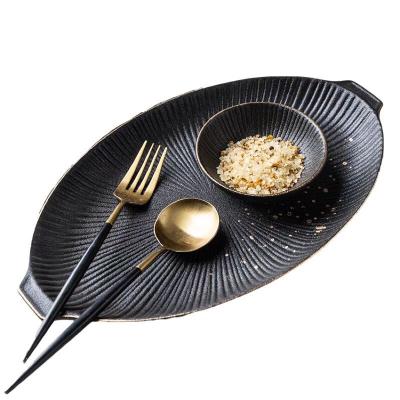 China Wholesale 12 Inch Viable Black Factory Direct OEM Matt Glaze Ceramic Fish Plate Enamel Dishes With Handle for sale