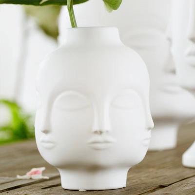 China Nordic white ceramic vase ware ceramic vase face design factory vases creative direct ceramic vase vase for sale