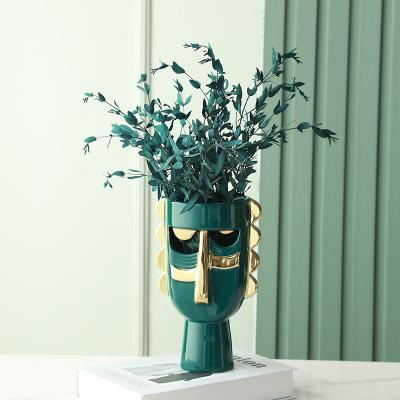 China Ceramic vases factory direct design creative vase with face wholesale ceramic vases for home decor ceramic face vase for sale