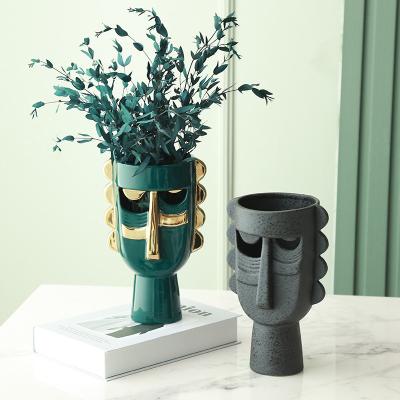 China Creative Design Ceramic Wholesale Face Vases Items Ceramic Vases For Home Decor Nordic Vase for sale