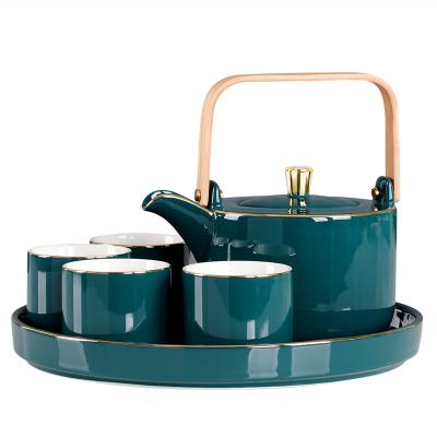 China Sustainable Dark Green Golden Rim 6pcs Japanese Ceramic Tea Set With Metal Handle And Tray for sale