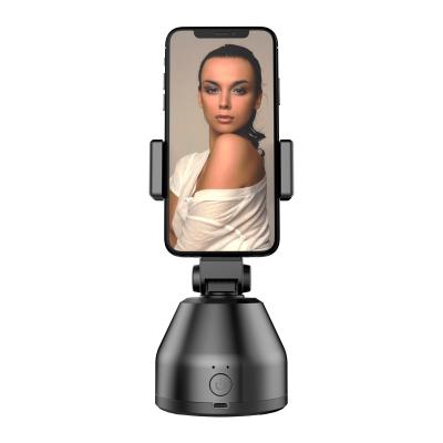 China 2020 Hot Selling AI Authomatic Genie Portable Smart Shooting 360 Rotation Auto Face Adjustable Object Tracking Cell Phone Holder for sale