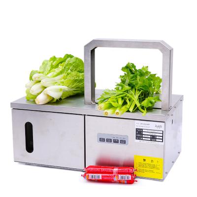 China Food grade table top OPP small size vegetable rubber free 30cm belt tying machine for sale