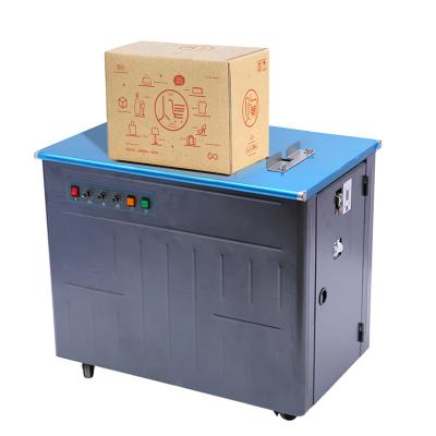 China Food CE carton packing semi-automatic low motor double table pp thermal strapping machine for box for sale