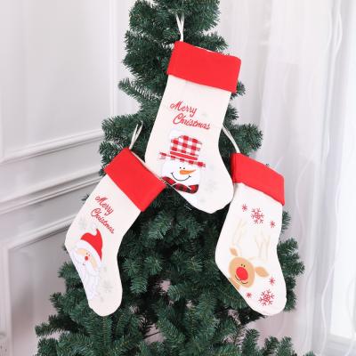 China 2021 Wholesale Christmas Ornament Embroidery Christmas Stocking Gift Canvas Christmas Bags Bags Stockings for sale