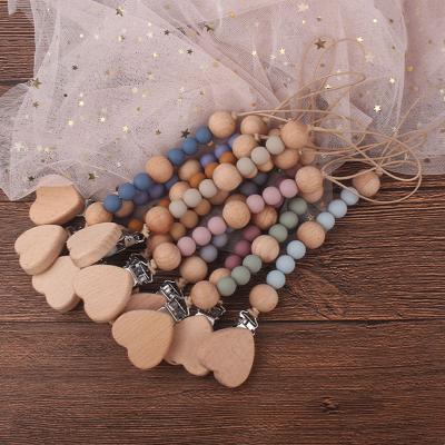 China 2021 Baby Heart Soother Dummy Free Pacifier Clips Wooden BPA Silicone DIY Beads Baby Chain for sale