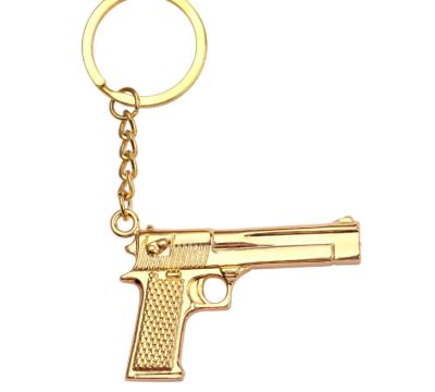 China Popular Promotion Golden Gun Key Chain 3D Metal Pistol Keychain Game Weapon Key Souvenir or Charm for sale