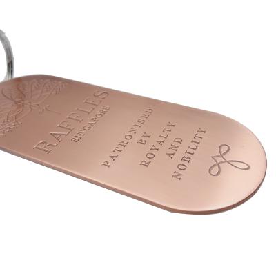 China Hotel Promotion Copper Oval Shaped Hotel Key Ring Promotional Key Chain Singapore Key Chain for sale