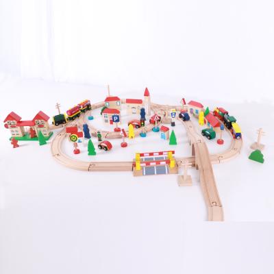 China 100pc Hot sale wooden train track toys set magical track assemble block vehicle toys railway play track car racing set for sale