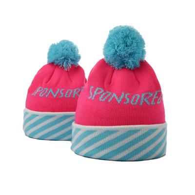 China COMMON custom winter pom logo jacquard skull beanie hat warm hats for women for sale