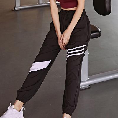 China High Waist Breathable Sports Gaiters Running Leggings Customize Logo Sport Ladies Yoga Pants With Pockets for sale