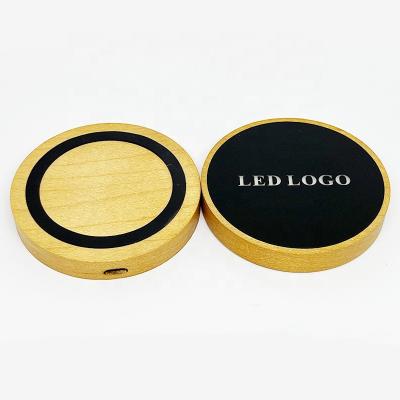 China 2022 Mobile Phone Company Gift Light Up Logo Wood Wireless Charger LED Custom Logo Color for sale