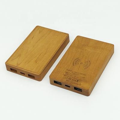 China Low Price 5000mAh Mobile Phone 2.1A Fast Charging Wooden Mobile Phone Charger Power Bank for sale