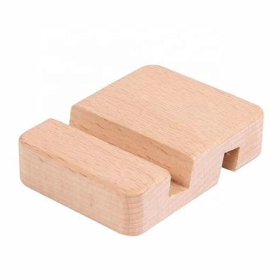 China Universal Mobile Phone/Tablet Stand Wholesale Phone Holder Hole Smartphone Wooden Tablet Stand for sale