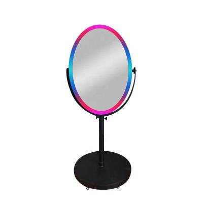 China 2022 Black Oval Wedding Party Events New Arrival Shopping Mall Photo Booth Mirror Photo Booth Stock Fast Shipping Customized Photobooth for sale