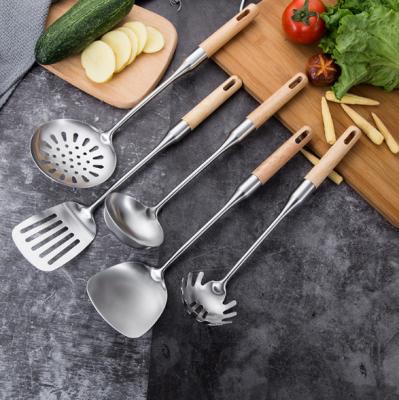 China Sustainable Stainless Steel Utensils Kitchen Set Wood Handle Cooking Tools Hanging Design for sale