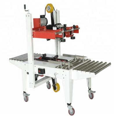 China Semi-automatic GARMENT FXJ 5050 right and left animated carton sealer for sale