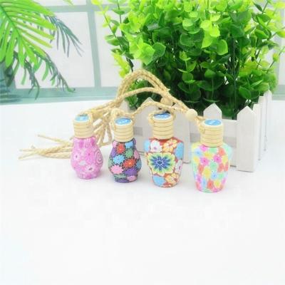 China Personal Care Wholesale 5Ml 8Ml 10Ml 12Ml 15Ml 18Ml Wooden Cap Porcelain Perfume Bottle For Car for sale