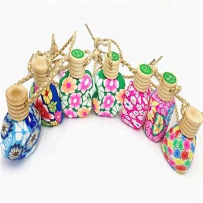 China Personal Care New Design Elegant Clay Car Hanging Perfume Bottle Printed Perfume Bottles for sale