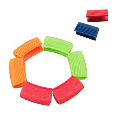 China Various Colors Kitchen Stocked Against Hot Oven Protect Hands Silicone Pot Handle Holder for sale