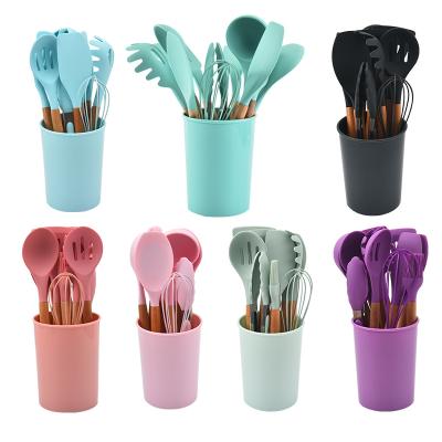 China 12 Piece Sustainable Silicone Cooking Kitchen Utensils Set With Wooden Handle Holder Spatula for sale