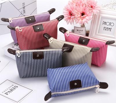 China NATIONAL Folding Toiletry Bag Toiletry Bag Stripe Promotion Cosmetic Organizer Portable Dumpling Travel Makeup Bag Women Make Up Female Wash Bag for sale