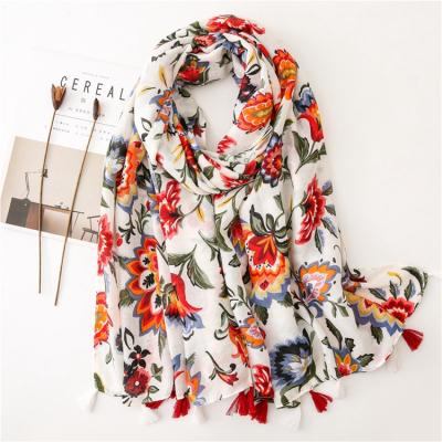 China Spring Summer Sunscreen Shawl Designer Scarf Women Cotton Flower Print Soft Smooth Feeling Floral Scarf With Tassel for sale