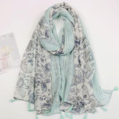 China Fresh Undamaged Floral Printed Snap Screen Hijabs Sun Fashion Tassel Scarf Soft Soft Feel Cotton Muslim Viscous Headwrap Pashmina Pashmina for sale