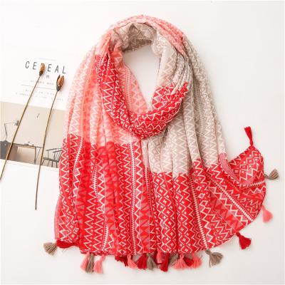 China Manufacturer Feeling Smooth Soft Multicolor Irregular Triangle Printed Thin Soft Cotton Women Tassel Squishy Shawl Scarf for sale