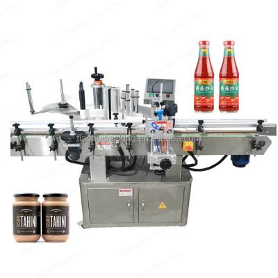 China High quality automatic olive lecythus bottle butter drink peanut labeling machine for sale