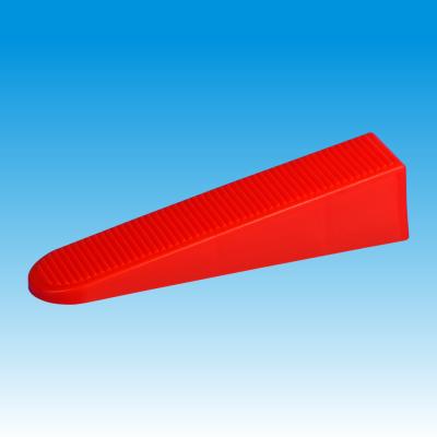 China Zero Cost Effective High Tile Leveling System Reusable Red Wedge for sale