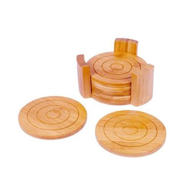 China New Sustainable Kitchen Heat Resistant Round Bamboo Wooden Coaster Set With Groove Durable for sale