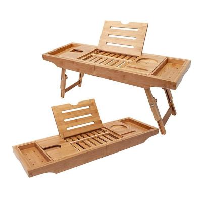 China Sustainable Expandable Luxury Bathroom Tub Caddy Tray With Adjustable Legs Bed Tray Wooden Bamboo Table With Folding 4 Legs for sale