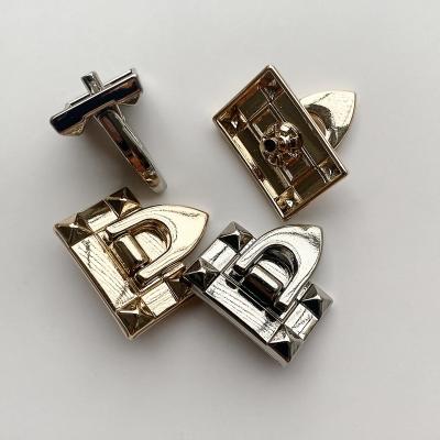 China Sustainable Wholesale  brand engrave logo Zinc Alloy   four parts   spring Women's Decorative clasp  metal button  snap Luggage buttons for sale