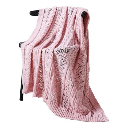 China Amazon Solid Anti-pilling Knitted Blanket Home Wholesale Sofa Knitted Blanket Hollow Out Polyester Throw Decor for sale