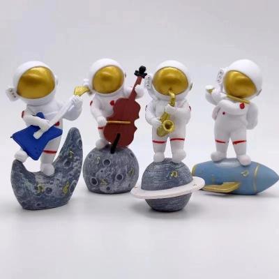 China Cartoon Toy High Quality Astronaut Action figure print resin Popular Toy Anime Cartoon PVC Figure 3D gifts for kids for sale