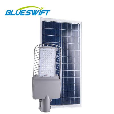 China Road Outdoor Garden IP65 30W Aluminum Road LED Solar Street Light With Pole for sale