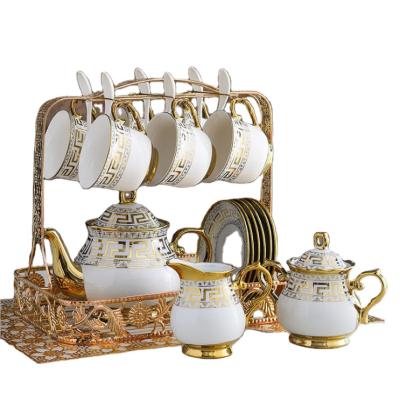 China Viable Gold 24pcs Tea Set with Iron Holder Tea Box Sugar Coffee Canister Teapot Electroplating Tea Cup Set of 6 for sale