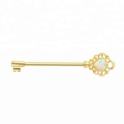 China Key Shape Gold Industrial Key Body Piercing Jewelry With White Opal for sale