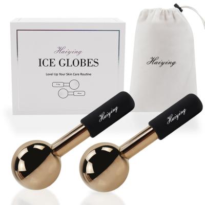 China Skin Tightening High End Stainless Steel Face Beauty Cryo Sticks Rose Gold Ice Derma Roller for sale