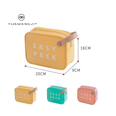 China Small Size Private Label TPU Wash Bag Women Candy Cosmetics Lipstick Bag Durable Wholesale Waterproof Cosmetic Portable Storage Bag for sale